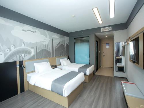 Imagen de la habitación del Hotel Thank Inn Changsha Ningxiang Avenue High-Speed Railway Station. Foto 18