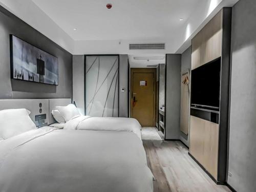 Imagen general del Hotel Thank Inn Hengyang Leiyang City Jinhua Road. Foto 7