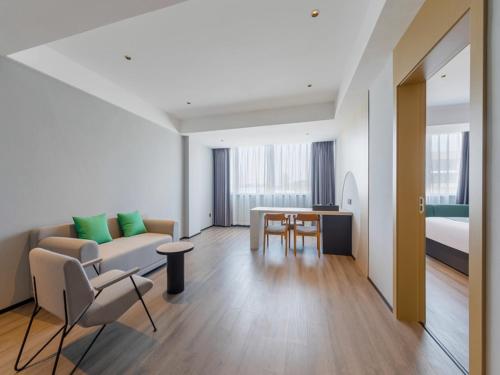 Imagen de la habitación del Hotel Thank Inn Linyi Jiaxing Fruit Market. Foto 15