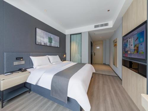 Imagen de la habitación del Hotel Thank Inn Linyi Jiaxing Fruit Market. Foto 16
