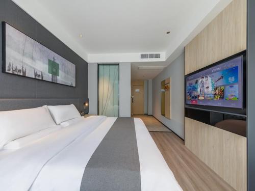 Imagen general del Hotel Thank Inn Linyi Jiaxing Fruit Market. Foto 12