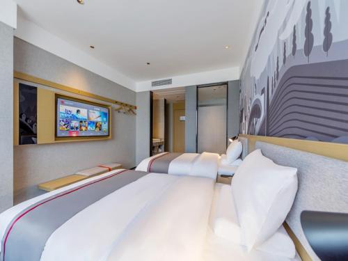 Imagen de la habitación del Hotel Thank Inn Linyi Jiaxing Fruit Market. Foto 19