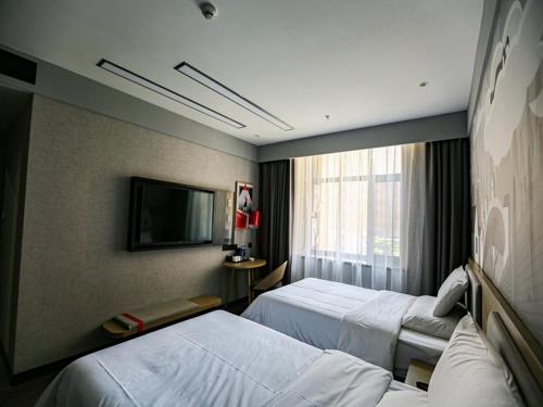 Imagen de la habitación del Hotel Thank Inn Plus Baotou Kundulun District University of Science and Technology. Foto 19