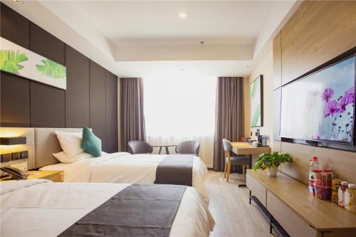 Imagen de la habitación del Hotel Thank Inn Plus Changsha Ningxiang Ningbang Plaza Pedestrian. Foto 17