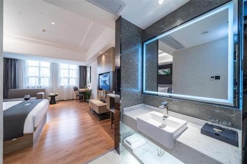 Imagen de la habitación del Hotel Thank Inn Plus Chaozhou Caitang Lotus. Foto 14