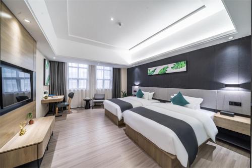 Imagen de la habitación del Hotel Thank Inn Plus Chaozhou Caitang Lotus. Foto 18