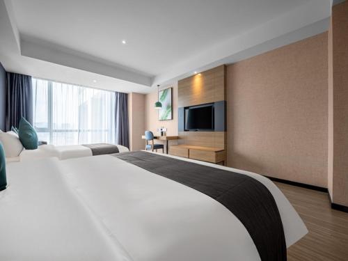 Imagen general del Hotel Thank Inn Plus Zhuji High-Speed Railway Statio Wangyun Road. Foto 14