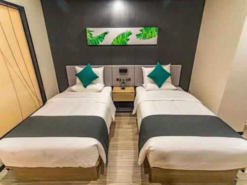 Imagen de la habitación del Hotel Thank Inn Plus Zhuji Jiyang Street Small Commodity Wholesale Market. Foto 17