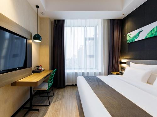 Imagen de la habitación del Hotel Thank Inn Shangqiu Xiayi Chuangye Road. Foto 16