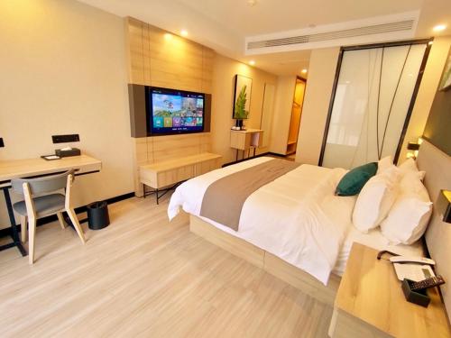 Imagen general del Hotel Thank Inn Zaozhuang Tengzhou Jinghe Road Zhenai Mall. Foto 3