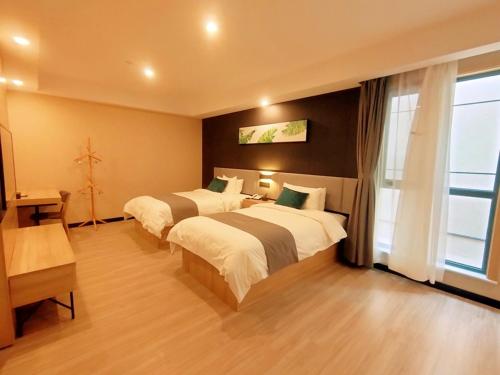 Imagen general del Hotel Thank Inn Zaozhuang Tengzhou Jinghe Road Zhenai Mall. Foto 7