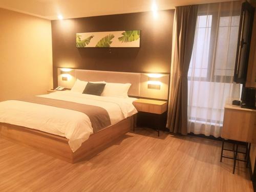 Imagen general del Hotel Thank Inn Zaozhuang Tengzhou Jinghe Road Zhenai Mall. Foto 11
