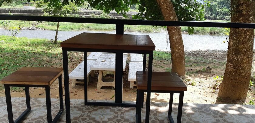 Imagen de la habitación del Hotel Thannam River Resort. Foto 14