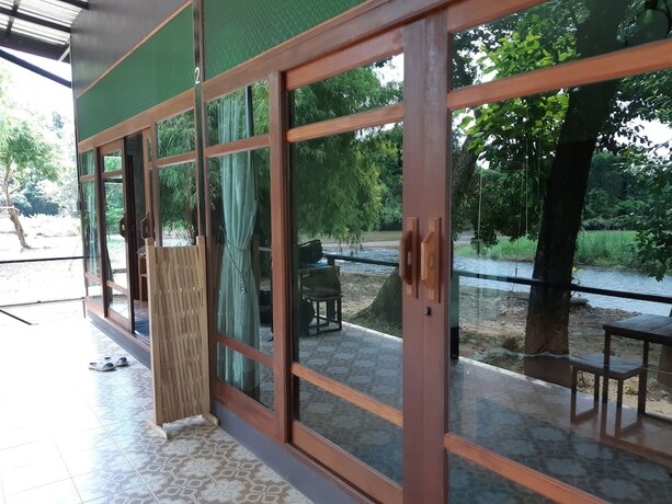 Imagen de la habitación del Hotel Thannam River Resort. Foto 15