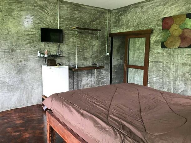 Imagen de la habitación del Hotel Thannam River Resort. Foto 18