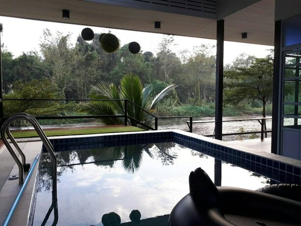 Imagen de la habitación del Hotel Thannam River Resort. Foto 19