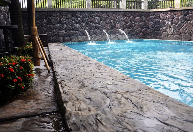 Imagen de la piscina del Hotel Thannatee Boutique. Foto 15