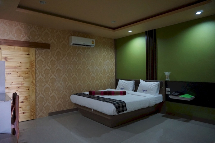 Imagen de la habitación del Hotel Thansila Resort. Foto 7