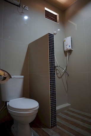 Imagen de la habitación del Hotel Thansila Resort. Foto 11