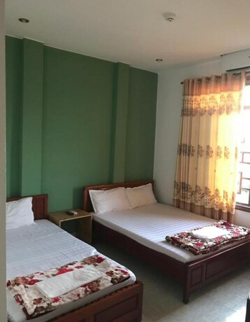 Imagen de la habitación del Hotel Thao Trang Dong Hoi. Foto 23