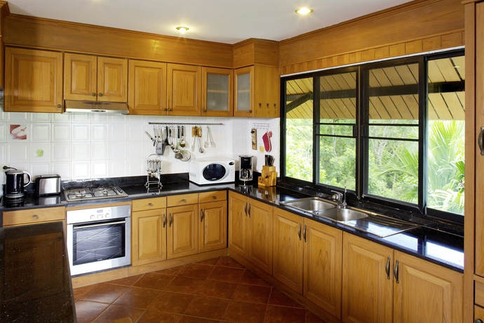 Imagen de la habitación del Hotel Thara Bayview Villa. Foto 2
