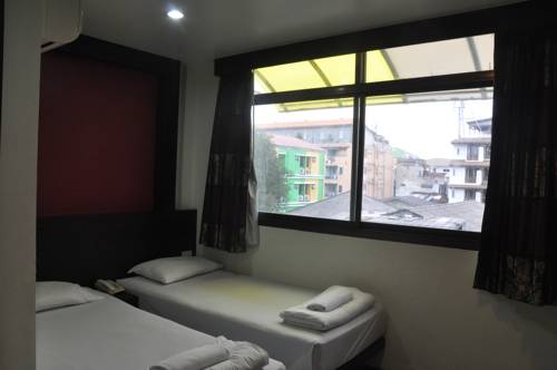 Imagen de la habitación del Hotel Thara House. Foto 8