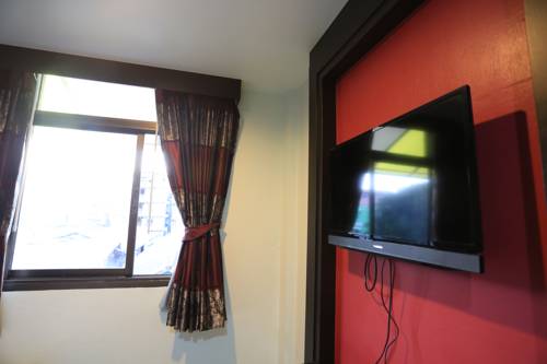 Imagen de la habitación del Hotel Thara House. Foto 12