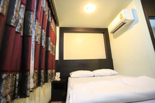 Imagen de la habitación del Hotel Thara House. Foto 13