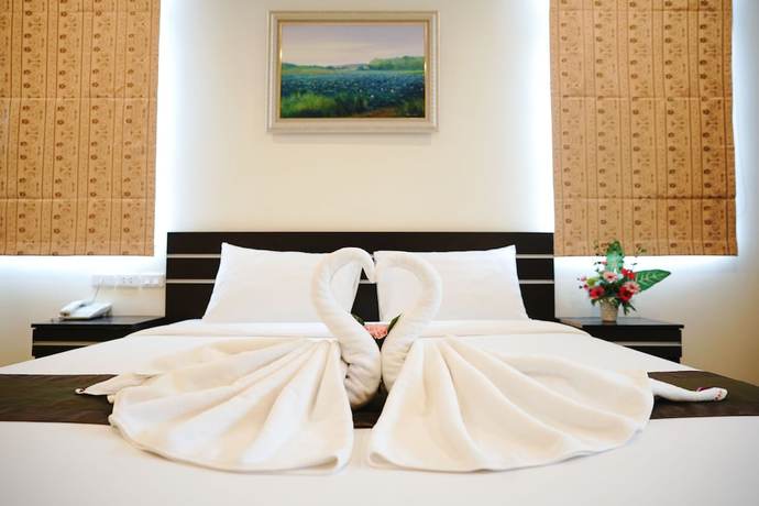 Imagen de la habitación del Hotel Tharakiree Place. Foto 3