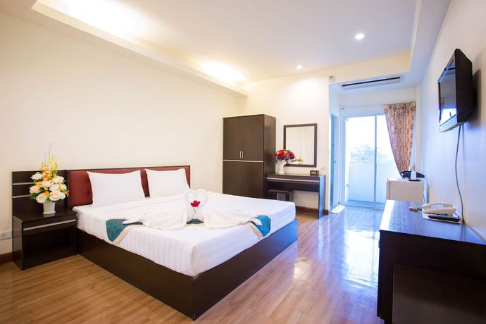 Imagen de la habitación del Hotel Tharakiree Place. Foto 4