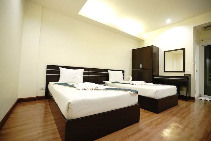 Imagen de la habitación del Hotel Tharakiree Place. Foto 8
