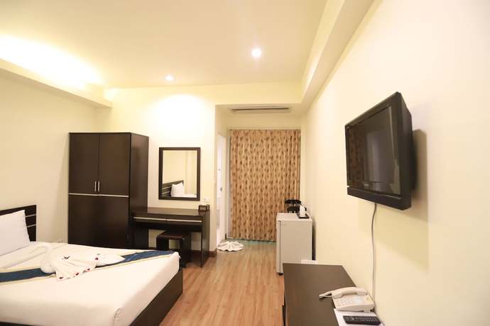 Imagen de la habitación del Hotel Tharakiree Place. Foto 10