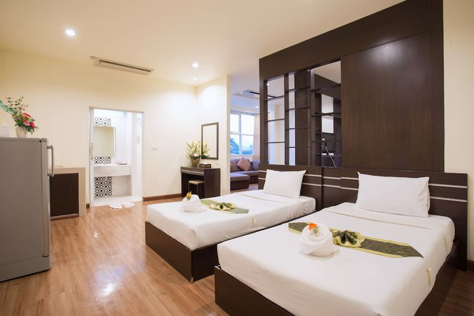 Imagen de la habitación del Hotel Tharakiree Place. Foto 11
