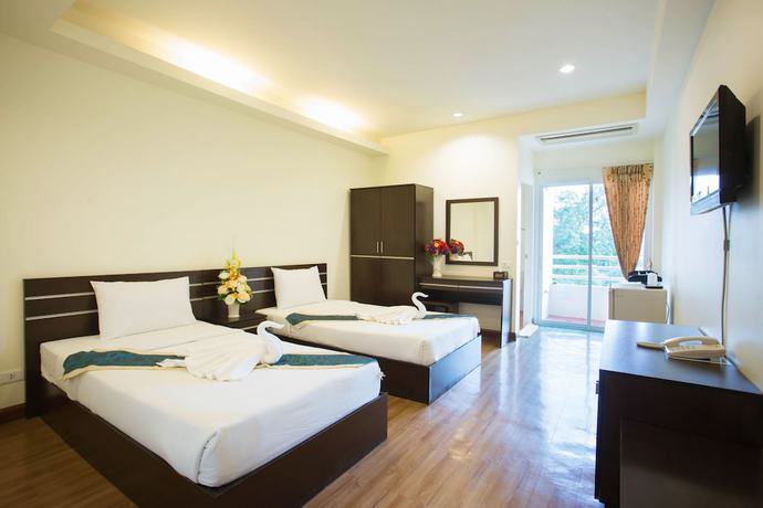 Imagen de la habitación del Hotel Tharakiree Place. Foto 12