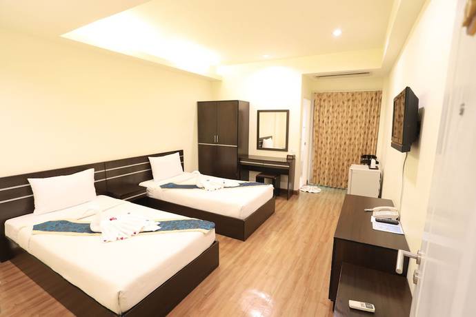 Imagen de la habitación del Hotel Tharakiree Place. Foto 16