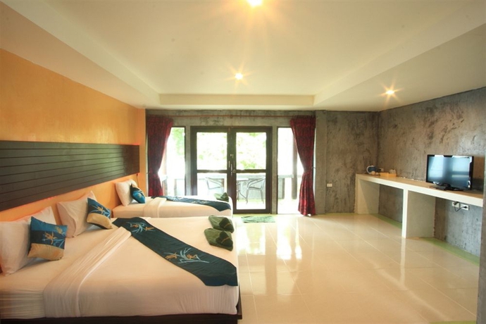 Imagen de la habitación del Hotel Tharathip Resort. Foto 8
