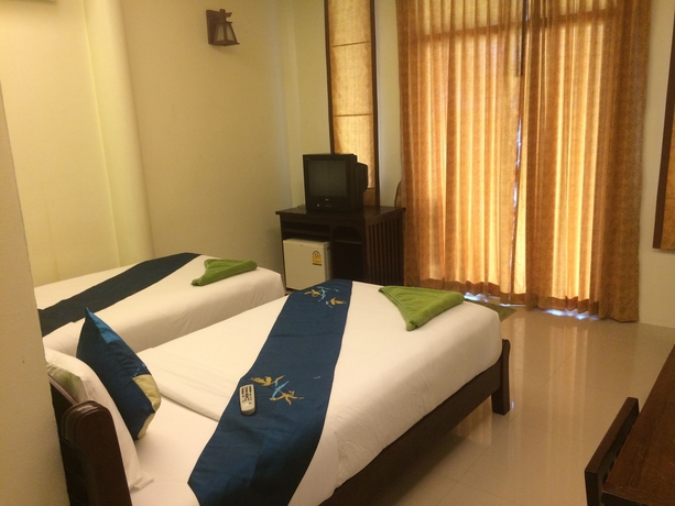 Imagen de la habitación del Hotel Tharathip Resort. Foto 11