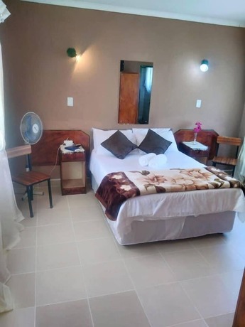 Imagen de la habitación del Hotel Thatch Palace Lodge. Foto 13