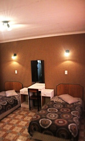 Imagen de la habitación del Hotel Thatch Palace Lodge. Foto 15