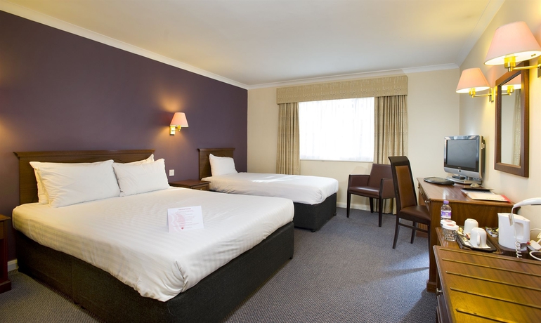 Imagen de la habitación del Hotel Thatcher's. Foto 5