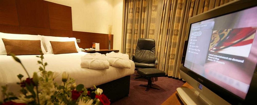 Imagen de la habitación del Hotel Thatcher's. Foto 7