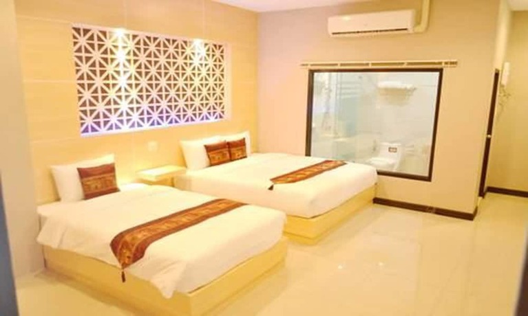 Imagen de la habitación del Hotel Thatluang View. Foto 16