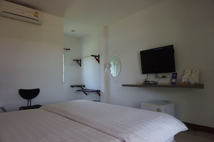 Imagen de la habitación del Hotel Thatphanom Place. Foto 9