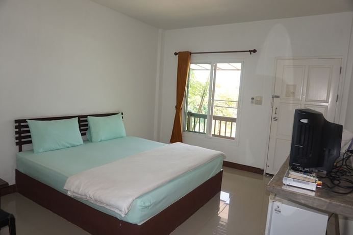 Imagen de la habitación del Hotel Thatphanom Place. Foto 10