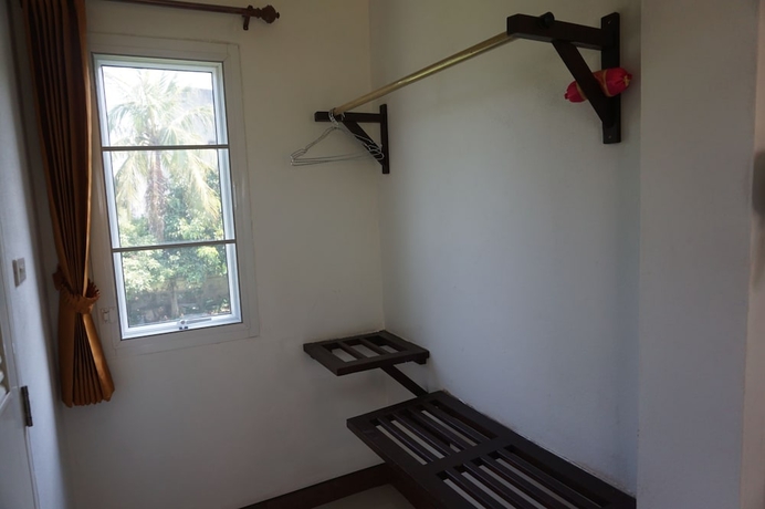 Imagen de la habitación del Hotel Thatphanom Place. Foto 12