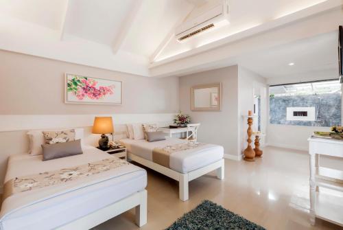 Imagen de la habitación del Hotel Thavorn Beach Village Resort & Spa. Foto 8