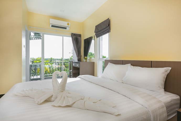 Imagen de la habitación del Hotel Thawan Apartment. Foto 10