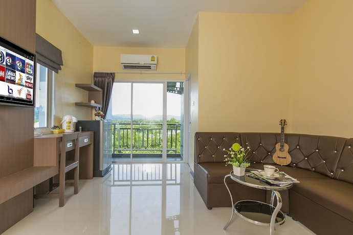 Imagen de la habitación del Hotel Thawan Apartment. Foto 11