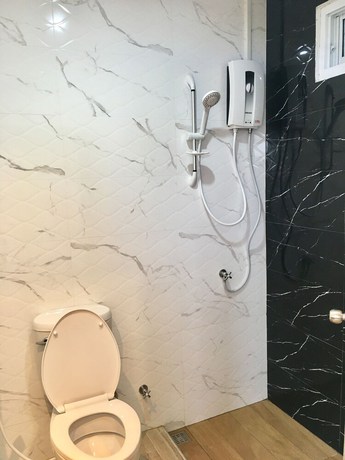 Imagen de la habitación del Hotel Thawat. Foto 3