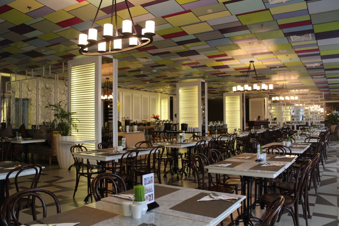 Imagen del bar/restaurante del Hotel The 1o1 Bogor Suryakancana. Foto 10